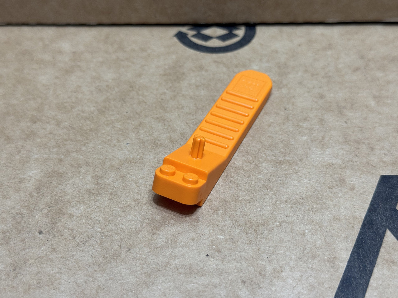 LEGO Parts - Orange Brick and Axle Separator - No 96874 - QTY 1