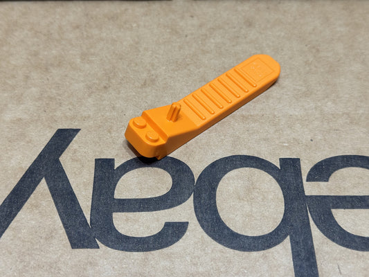 LEGO Parts - Orange Brick and Axle Separator - No 96874 - QTY 1