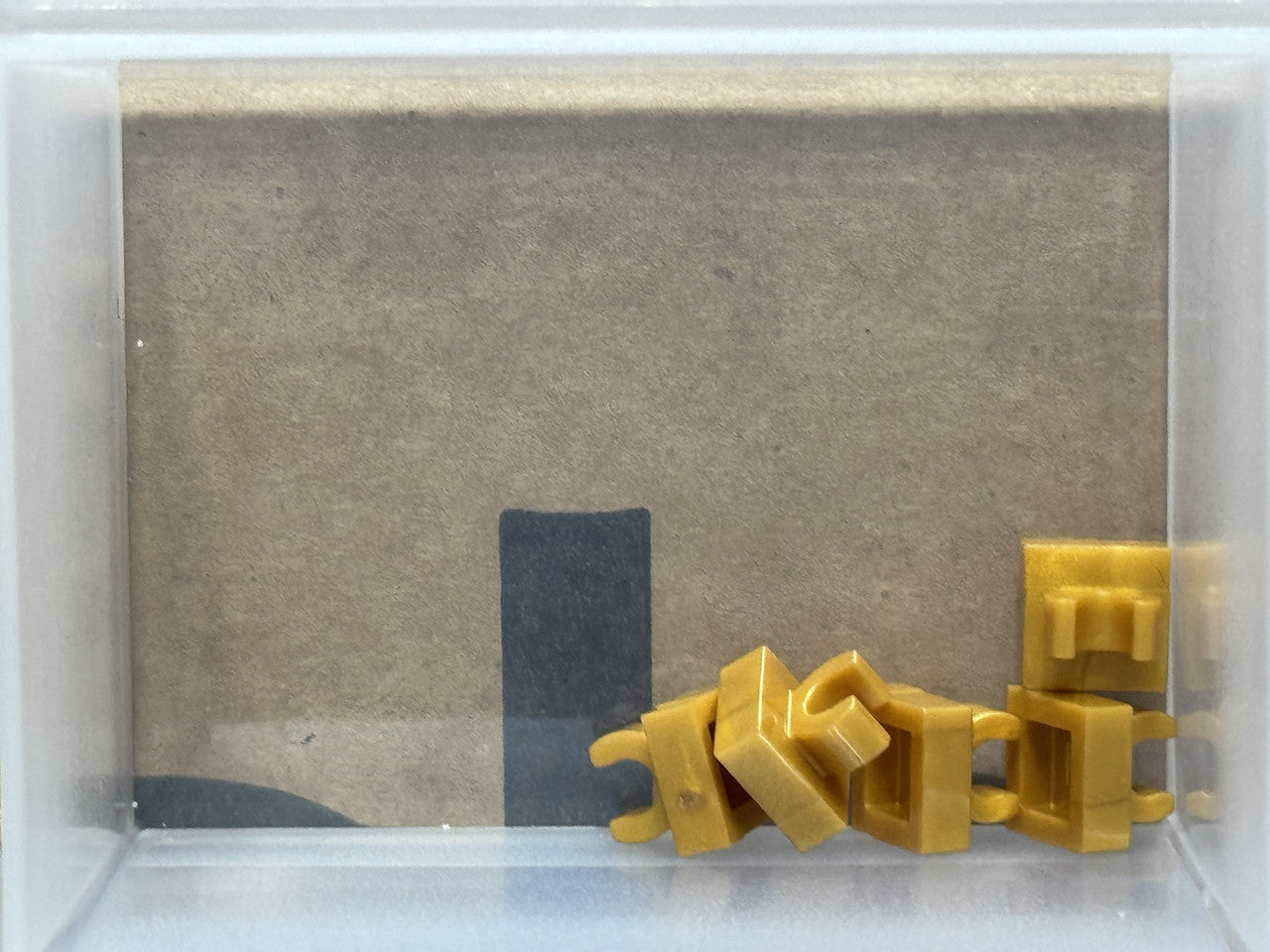 LEGO Parts - Pearl Gold Tile, Modified 1 x 1 with Open O Clip - No 15712 - QTY 5