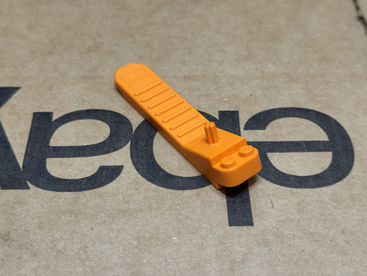 LEGO Parts - Orange Brick and Axle Separator - No 96874 - QTY 1
