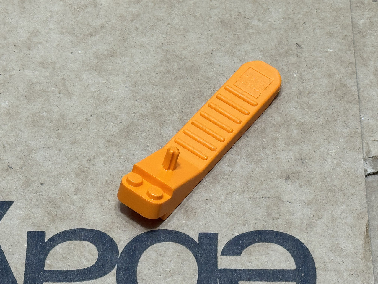 LEGO Parts - Orange Brick and Axle Separator - No 96874 - QTY 1